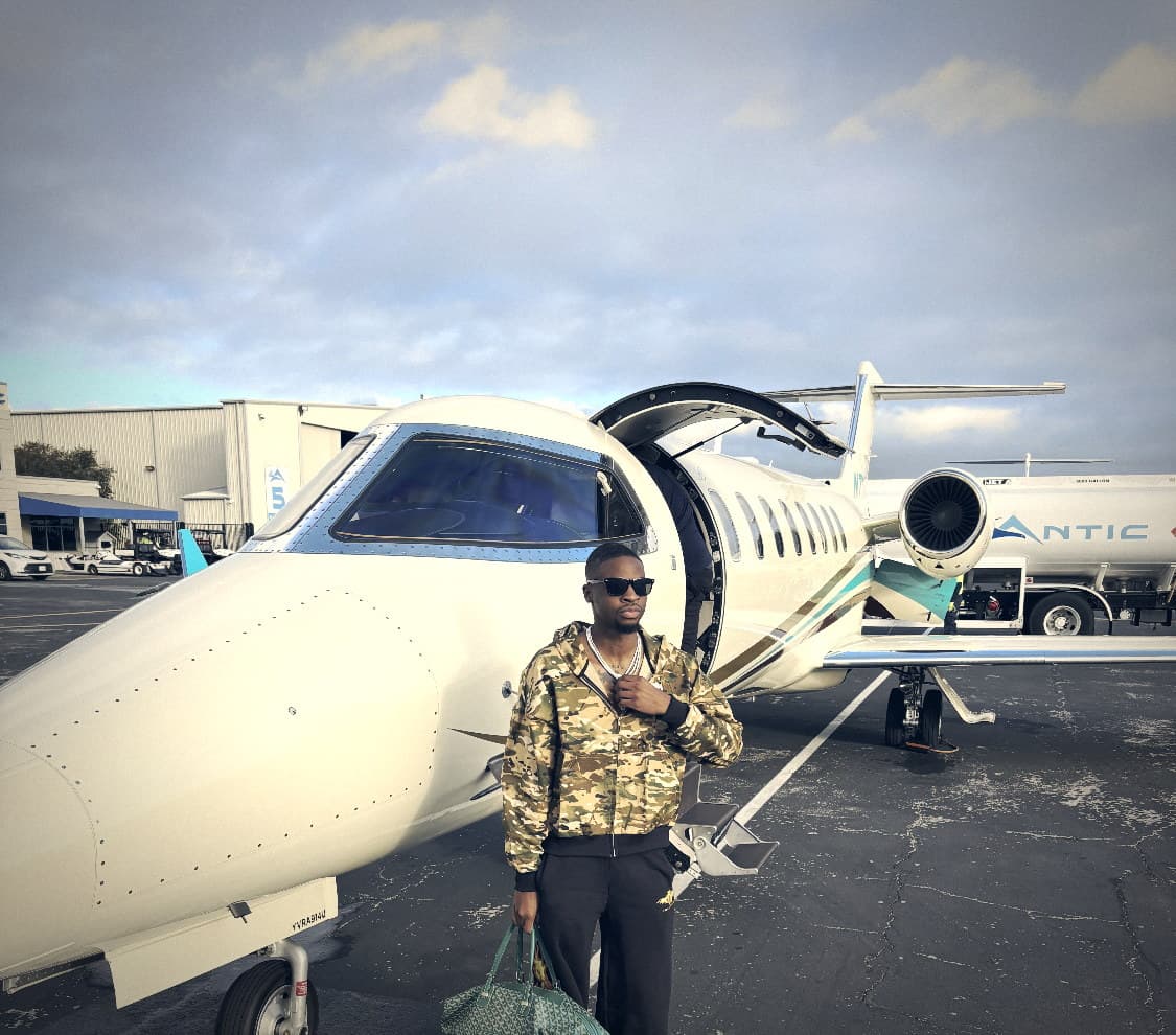Tito beside the jet nose, Houston
